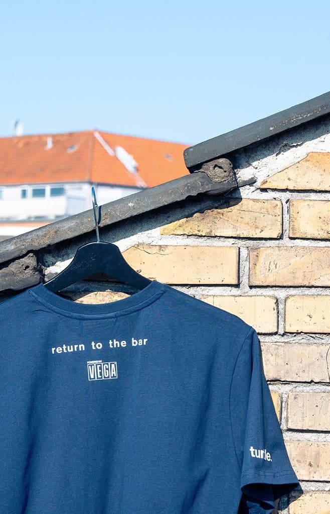 a blue shirt that says return to the bar vega